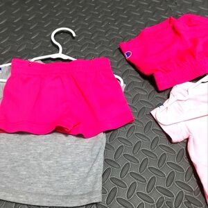 Two twin girl Champion short sets